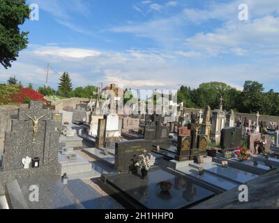 cemetery death stoned funeral sadness marble pena flowers Stock Photo