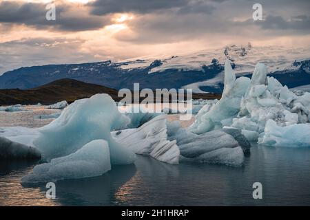 Icebergs floating. Ices and icebergs. Glacier lagoon. Greenland iceberg. Melting ice. South coast Iceland. Jokullsarlon glacier lagoon. Volcanic ash Stock Photo