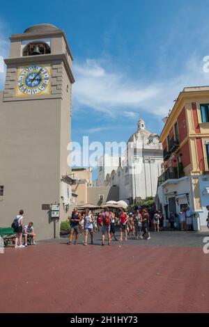 CAPRI, ITALY - JULY 29, 2018: Tourists visit Piazza Umberto I, the most famous square of the island of Capri. Italy Stock Photo