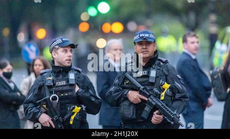 London, UK. 18th Oct, 2021. Procession from the Houses of Parliament to St Margret's Church Westminster for a service of remembrance for the murdered MP Sir David Amiss Heavy security at the event Credit: Ian Davidson/Alamy Live News Stock Photo