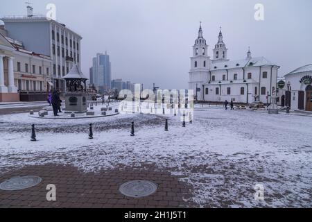 Minsk, Belarus - November 26, 2019: NemigaTrinity Suburb. The cathedral of Holy Spirit in the snow. Stock Photo