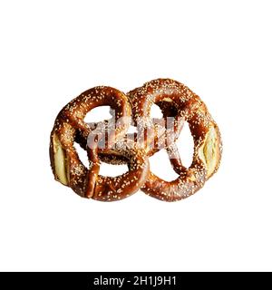 two delicious Brezels. Delicious Bavarian pretzel isolated on a white background. Stock Photo