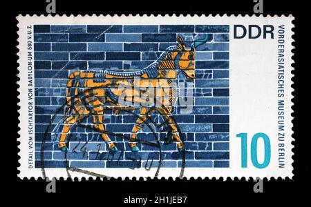 Stamp issued in Germany - Democratic Republic (DDR) shows Bull of the Ishtar Gate,  Babylon, Near Eastern Museum, Berlin, circa 1966 Stock Photo