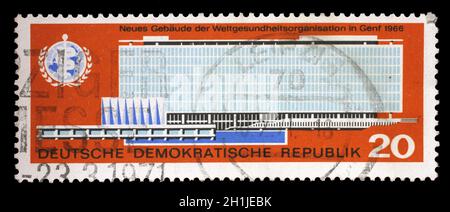 Stamp issued in Germany - Democratic Republic (DDR) shows New W.H.O. building, Inauguration of W.H.O. Headquarters, Geneva, circa 1966. Stock Photo