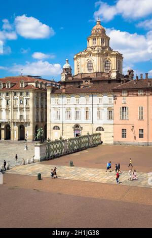 TURIN, ITALY - CIRCA AUGUST 2020: perspective on the elegant and Baroque Saint Lawrence church in Turin. Amazing natural light with a blue sky. Stock Photo