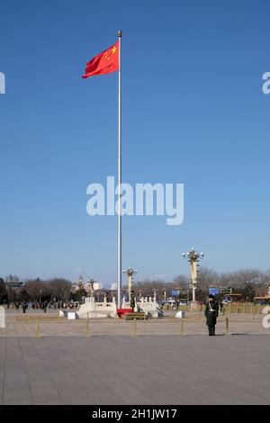 Soldiers guard the Chinese flag in Tiananmen Square in Beijing Stock Photo