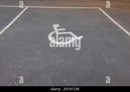Close up view of disabled parking spot asphalt marking. Sweden. Stock Photo