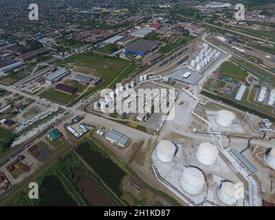 Oil refinery plant for primary and deep oil refining. Equipment and tanks in the oil refinery. Rectification and vacuum equipment Stock Photo