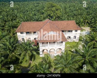 Nibong Tebal, Penang/Malaysia - Jun 27 2019: Aerial view 99 doors mansion at oil palm estate. Stock Photo