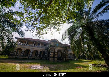 Nibong Tebal, Penang/Malaysia - Jun 28 2019: Colonial building 99 door mansion in oil palm estate. Stock Photo