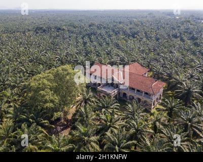 Nibong Tebal, Penang/Malaysia - Jun 27 2019: Aerial view abandoned 99 doors mansion in evening. Stock Photo