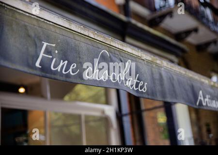 Up-close Picture of the Dark Blue Business Awning of a Fine Chocolates Shop From London, Uk