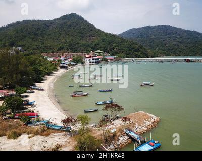 Teluk Bahang, Penang/Malaysia - Mar 08 2020: Boat park at coastal seashore Teluk Bahang. Stock Photo