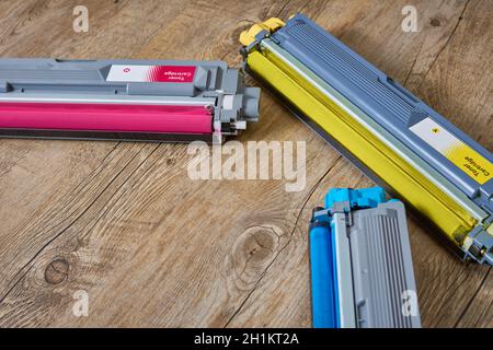 Set of three toner cartridges for color laser printers in yellow, cyan and magenta colors Stock Photo
