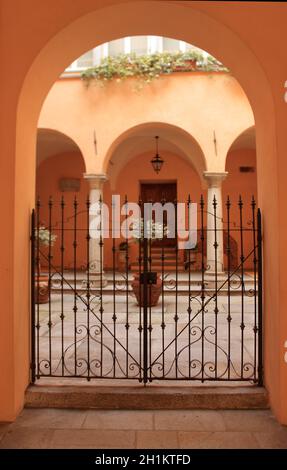 Acqui Terme, Italy - jan 2020: tourist walking in search of cityscape and courtyards. hires photo. Stock Photo