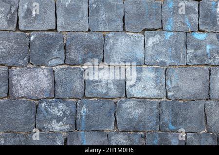 wall in blocks of volcanic stone. Ideal for backgrounds and textures Stock Photo