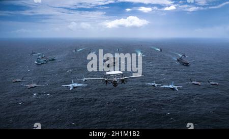 Bay of Bengal, India. 17th Oct, 2021. Multi-national aircraft lead a formation of the U.S. Navy Nimitz-class aircraft carrier USS Carl Vinson, center, Royal Navy Fleet Flagship HMS Queen Elizabeth, left, and Japan Maritime Self- Defense Force Izumo-class helicopter destroyer JS Kaga, right, during exercises October 17, 2021 in the Bay of Bengal, India. Credit: MC2 Haydn Smith/U.S. Navy/Alamy Live News Stock Photo