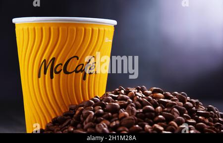 POZNAN, POL - AUG 21, 2020: McCafe cup of coffee, a brand of a coffee-house-style food and drink chain, owned by McDonald's. Stock Photo