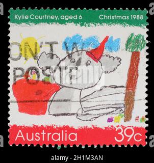 Stamp printed in the Australia shows Koala Wearing a Santa Hat, by Kylie Courtney, Childrens Design, Christmas, circa 1988 Stock Photo