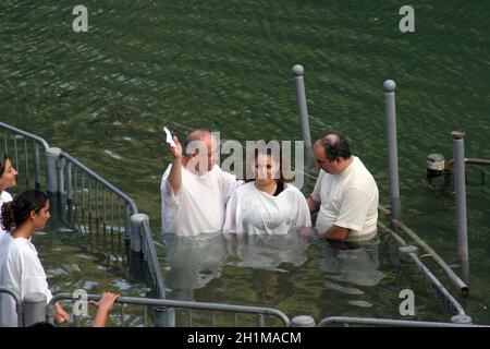 Baptismal site at Jordan river shore. Baptism of pilgrims  in Yardenit, Israel. Stock Photo