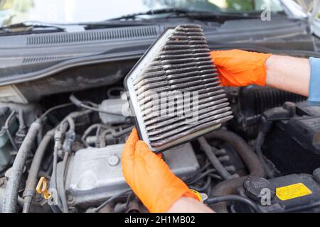Dirty car engine air filter Stock Photo