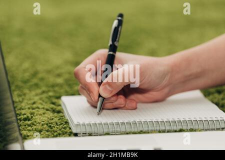 Close-Up Shot of Human Hands Placed Over Laptop. Stock Photo