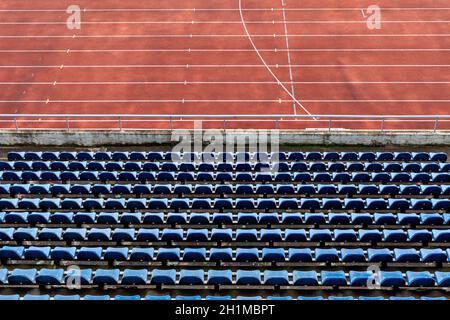 empty rows of seats in the auditorium of the athletic stadium. Stock Photo