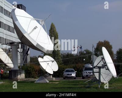 TV Station Up-link / Download Antennas - Broadcasting & Media Industry Stock Photo