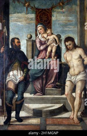 Tiziano Vecellio follower: Madonna and Child on the throne with St. Roch and St. Sebastian Stock Photo