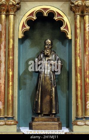 Saint Leopold Mandic, staue on the main altar in the church of the Saint Peter in Ivanic Grad, Croatia Stock Photo