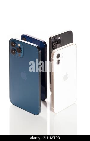 Bratislava, Slovakia - December 07, 2020. Various iPhone 12 smartphones isolated on white. Stock Photo