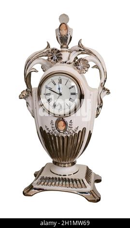 Porcelain mantel clock 19th century - is isolated on the white Stock Photo