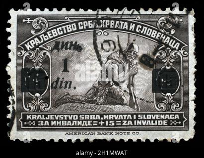 Stamp printed in Kingdom of Serbia, Croatia and Slovenia for the Benefit of Invalid Soldiers, circa 1921. Stock Photo