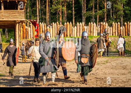 Cedynia, Poland June 2019 Historical reenactment of Battle of Cedynia, group of foot soldiers are marching for a patrol or scouting area, 11th century Stock Photo