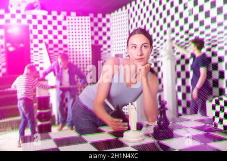 Portrait of a thoughtful young woman in a quest room Stock Photo