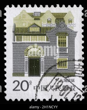 Stamp printed in China shows image of houses, series, circa 1977 Stock Photo