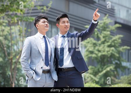 Businessmen looking into the distance Stock Photo