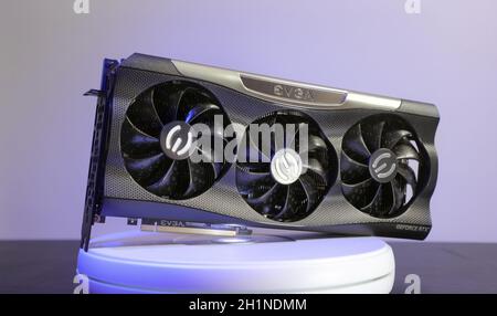Budapest, Hungary - Circa 2020: Nvidia Geforce RTX 3090 Graphics Card manufacturer by EVGA displayed on a spinning turntable under colorful RGB light. Stock Photo