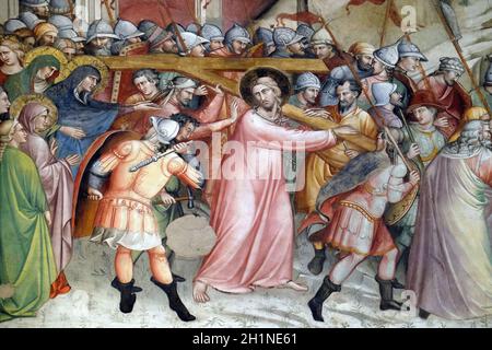 Ascent to Calvary fresco, perhaps by Spinello Aretino, Sacristy in Basilica di Santa Croce (Basilica of the Holy Cross) - famous Franciscan church in Stock Photo