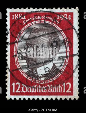 Stamp issued in German Realm shows Dr. Carl Peters (1856-1918), Colonial commemoration: Colonial researchers, circa 1934. Stock Photo