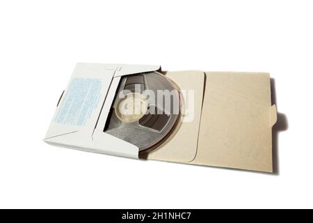 reel-to-reel tape spool with carton box on white background Stock Photo -  Alamy