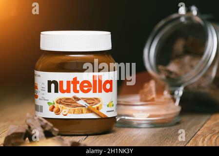 AACHEN, GERMANY - JAN 07, 2021: Pot of Nutella, the popular brand name of a sweetened hazelnut cocoa spread, introduced to the market in 1964 by Itali Stock Photo