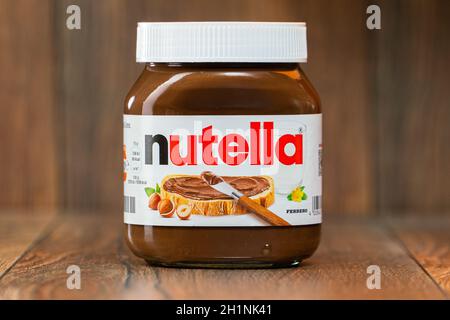 AACHEN, GERMANY - JAN 07, 2021: Pot of Nutella, the popular brand name of a sweetened hazelnut cocoa spread, introduced to the market in 1964 by Itali Stock Photo