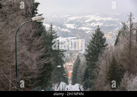 Aerial view of Krynica Zdroj from Parkowa Mountain on a winter clodu day Stock Photo