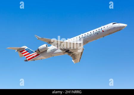 Phoenix, Arizona - April 8, 2019: American Eagle SkyWest Airlines Bombardier CRJ-700 airplane at Phoenix Airport (PHX) in Arizona. Stock Photo