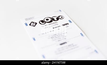 BAYONNE, FRANCE - CIRCA JANUARY 2021: Francaise des Jeux Loto receipt on white background. Loto is one of the games of Francaise des Jeux, France's na Stock Photo