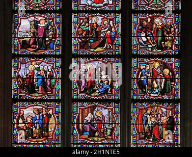 Scenes from the life of St. Genevieve, stained glass window in Church of Saint Leu Saint Gilles in Paris, France Stock Photo
