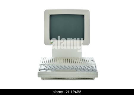 Vilnius, Lithuania - 03 September, 2020: Vintage classic Apple desktop computer from the eighties with integrated monitor and keyboard isolated on whi Stock Photo