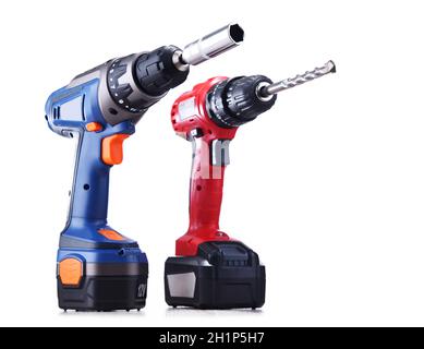 A screw gun and a pistol-grip cordless drill isolated on white background Stock Photo