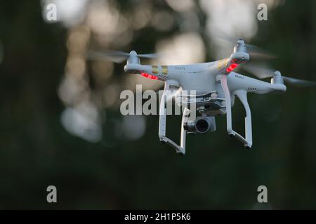 11 - Drone quad copter with stabilised camera used for photography. Professional applications in industrial inspection and surveillance also. Stock Photo